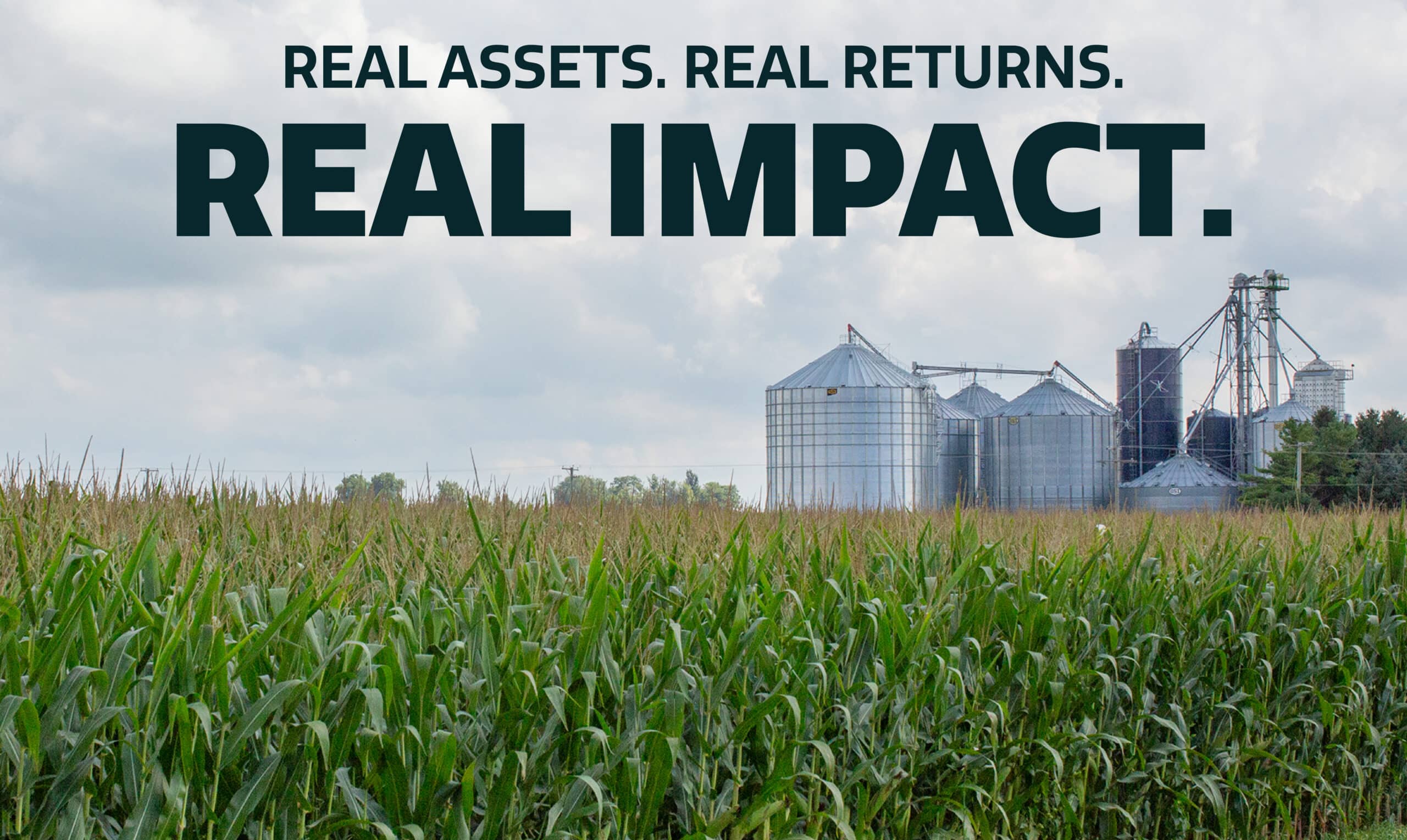 A cornfield with metal grain silos in the background under a cloudy sky. Text reads: "Real assets. Real returns. Real impact.